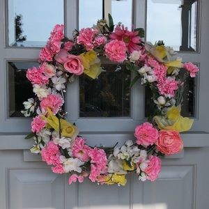 Large Faux floral wreath. About 20” across . Hand assembled